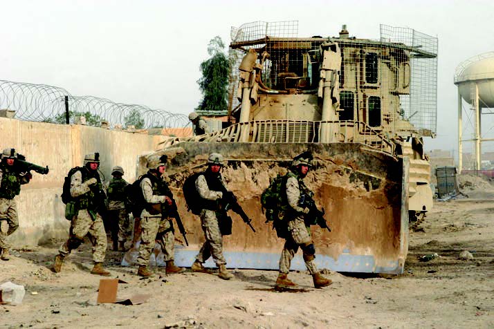 USMC grunts with D9, toward end of Fallujah battle, November 2004. (Photo by author.)